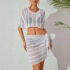 White ribbed knitted beach bikini set featuring a sheer ribbed knit two-piece with cropped top and wrap skirt