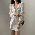 White sheer long sleeve shirt dress with puffed sleeves and tie waist featuring a drawstring waistband design