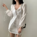 White ribbed long sleeve shirt dress with sheer sleeves and tie waist detail for a stylish sleeve shirt dress