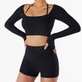 Black ribbed long sleeve crop top featuring chest pad slim fit with thin straps and matching high-waisted shorts