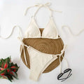 Cream-colored ribbed sexy bikini set with adjustable tie thong bandage and silver ring accents for stylish swimwear