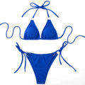 Vibrant royal blue ribbed sexy bikini set with adjustable tie thong bandage and silver-toned metal rings