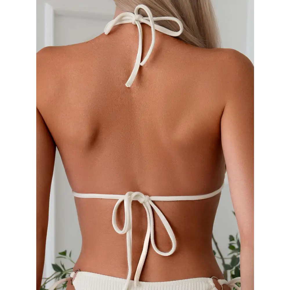 White ribbed sexy bikini set with gold ring accents and adjustable tie thong bandage for a flattering fit