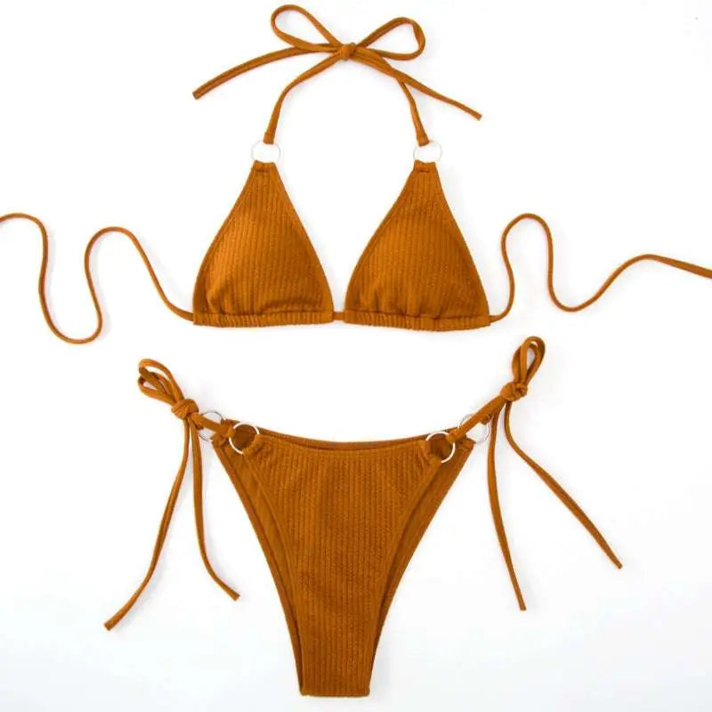 Ribbed sexy bikini set in mustard yellow featuring a triangle top with adjustable ties and thong bandage bottom with silver rings
