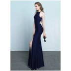 A sleek navy blue floor-length gown with side cutouts high neckline and thigh-high slit evening dress