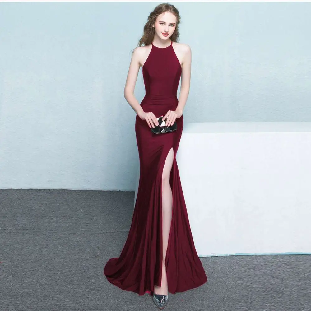 A sleek burgundy satin gown with a high neckline and thigh-high slit for an elegant neck evening dress look