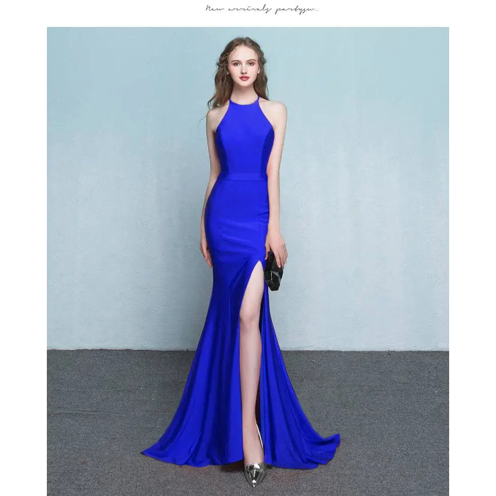 A striking royal blue satin mermaid gown with a high neckline and thigh-high slit for formal evening events