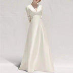 Elegant white satin wedding dress with satin v neck, three quarter sleeves, and long skirt for formal occasions