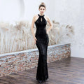 Black sequined mermaid evening dress with halter neckline and keyhole detail in white sequin polyester fiber