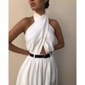 White sexy sleeveless halter backless jumpsuit with flowing white fabric draped asymmetrical neckline and black belt waist