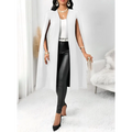 White sleeveless casual fit cape vest with sheer flowing fabric and cut-out sleeves for stylish layering