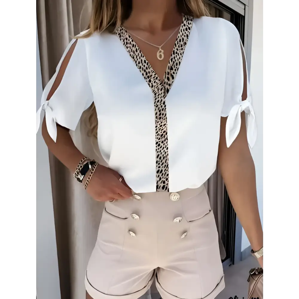 White solid color blouse with leopard print collar v-neck trim and tied shoulder details for stylish wear