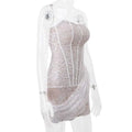 White strapless lace dress featuring a delicate light gray lace corset with white floral lace and vertical boning panels