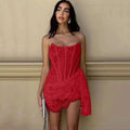A vibrant red strapless lace dress with a lace corset bodice and asymmetrical hemline for party wear