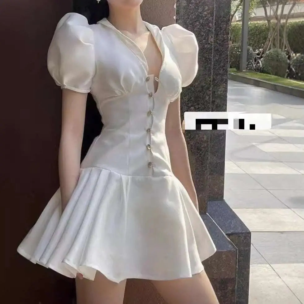 White sweet satin dress with fitted waist pleated skirt and puffy short sleeves in white satin material