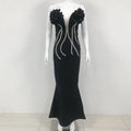 Black temperament socialite flower chain evening dress with floral shoulder embellishments and silver beaded detailing