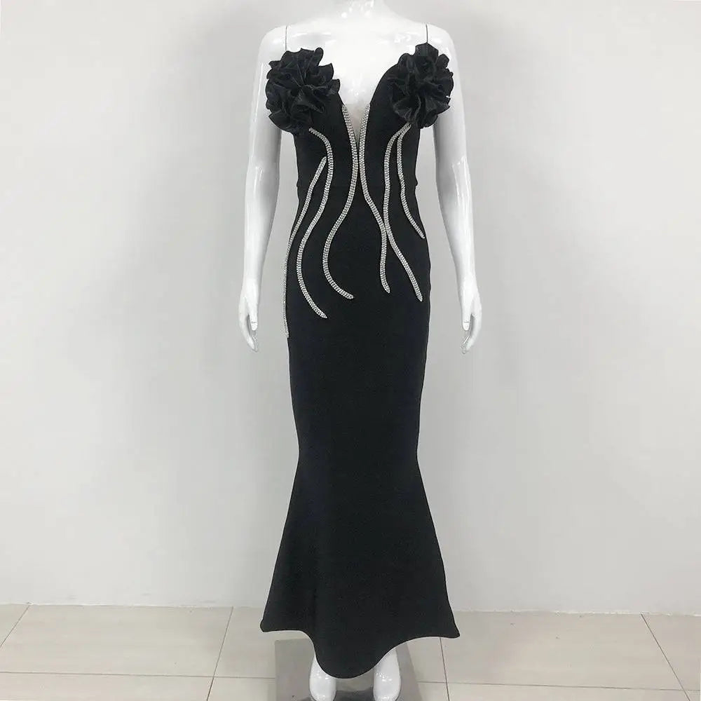 Black temperament socialite flower chain evening dress with floral shoulder embellishments and silver beaded detailing