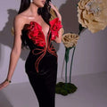 White temperament socialite flower chain evening dress in black velvet with red satin ruffles and gold trim