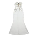 A sleek white temperament socialite flower chain evening dress with strapless mermaid silhouette and silver beaded strands