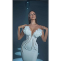 White temperament socialite flower chain evening dress featuring a form-fitting gown with ruffled shoulders and silver beadwork