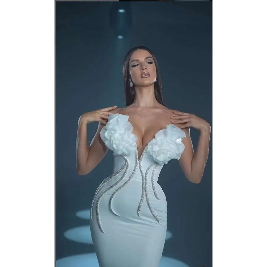 White temperament socialite flower chain evening dress featuring a form-fitting gown with ruffled shoulders and silver beadwork