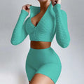 Teal textured long-sleeve zip-up crop top and high-waisted shorts set with tummy control and butt lift features