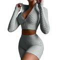 Gray textured long-sleeve zip-up crop top and high-waisted shorts set with tummy control and butt lift features