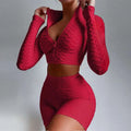 Vibrant red textured long-sleeve two-piece workout set with tummy control and butt lift high-waisted shorts