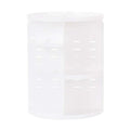 White translucent plastic laundry hamper with vertical slotted sides complements rotating makeup organizer for eyebrow pencils