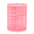 Pink plastic cylindrical rotating makeup organizer with multiple compartments and perforated sides for eyebrow pencils
