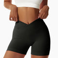 Black high-waisted tight seamless athletic shorts with ribbed waistband and supportive seamless design