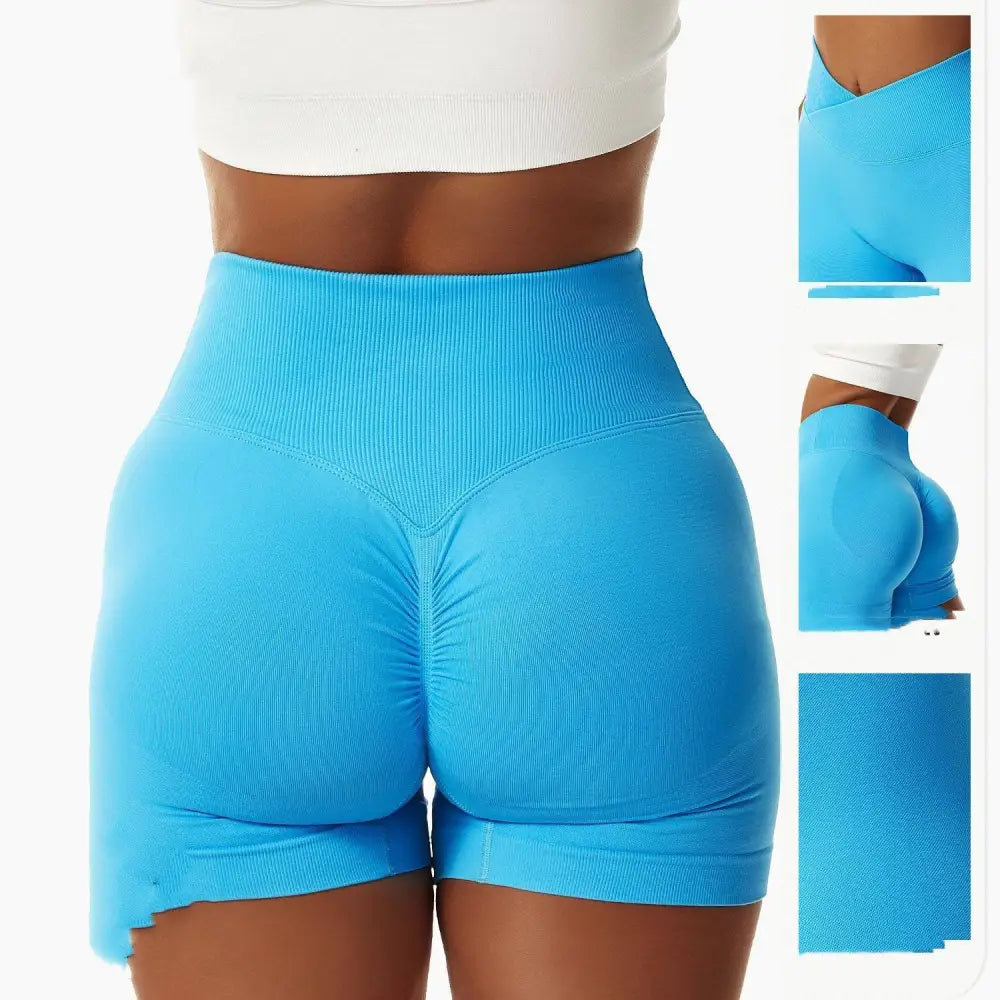 White high-waisted tight seamless sports shorts with ribbed waistband made of seamless fabric for athletic use