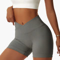Gray high-waisted tight seamless sports shorts with ribbed waistband and seamless fabric for athletic use