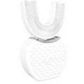 White ultrasonic electric toothbrush with soft bristles and textured base for automatic tooth cleaner use