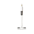 White wireless rechargeable vacuum cleaner with sleek ergonomic design, transparent dust container, and black accents