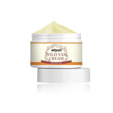 A white cylindrical jar of wiyun wild yam anti aging face cream with beige label and pale yellow cream inside