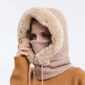 Beige windproof warm knit hooded scarf hat with faux fur trim and matching pom-pom for cold weather</assistant