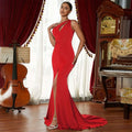 A woman wearing a wine red annual meeting dress with a solid color mermaid silhouette and elegant side slit and cut-out neckline