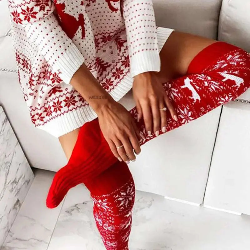Red and white knitted christmas thigh-high stockings with snowflake and reindeer patterns for winter christmas warm wear