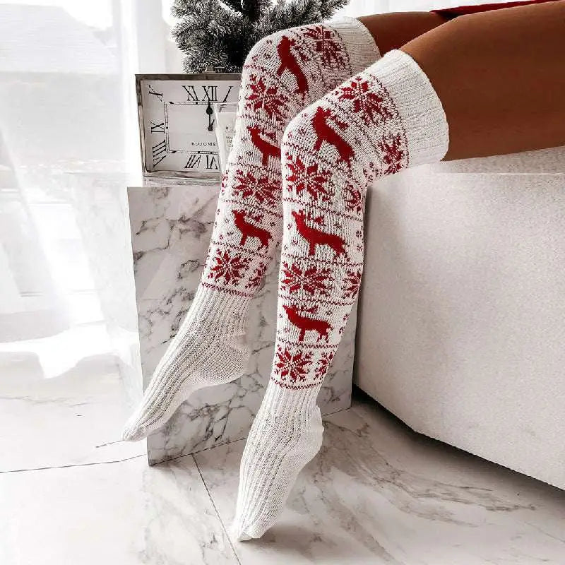 White knit over-the-knee christmas thigh-high stockings with red reindeer and snowflake patterns for winter christmas warm look