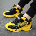 Black and yellow winter cotton shoes with waterproof leather uppers featuring lightning bolt designs and velcro straps