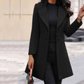 Black double-breasted lapel coat with sleek tailored design and subtle sheen for winter single-breasted slim-fit style