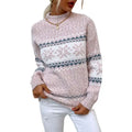 A cozy light pink knit winter snowflake sweater with a festive white and gray pattern and half turtleneck design