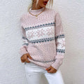 A cozy blush pink knit winter snowflake sweater with white and gray festive pattern and half turtleneck design