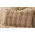Beige winter thickened rabbit plush faux fur sofa cushion with a plush textured surface and soft wavy ridges
