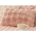 Winter thickened rabbit plush sofa cushion in soft pink faux fur with a wavy textured surface for cozy use
