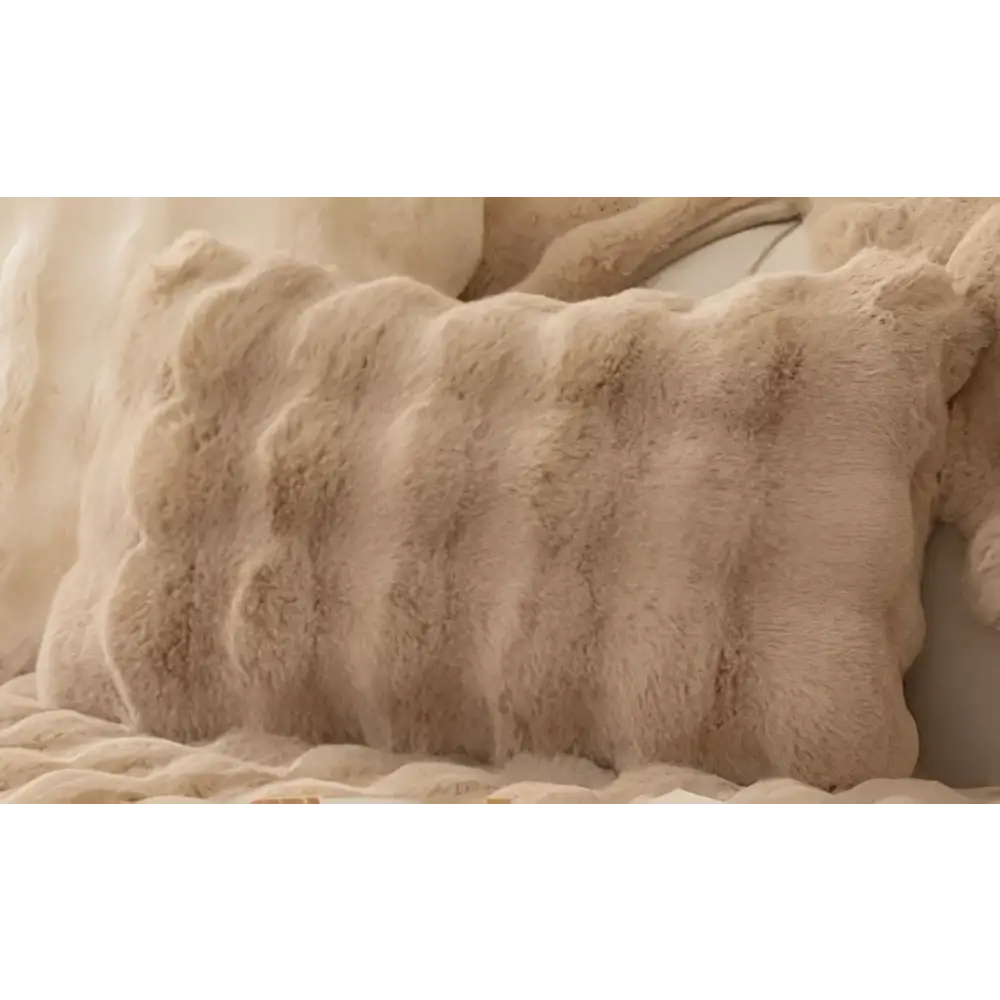Beige winter thickened rabbit plush faux fur sofa pillow with a soft textured surface and wavy ridges
