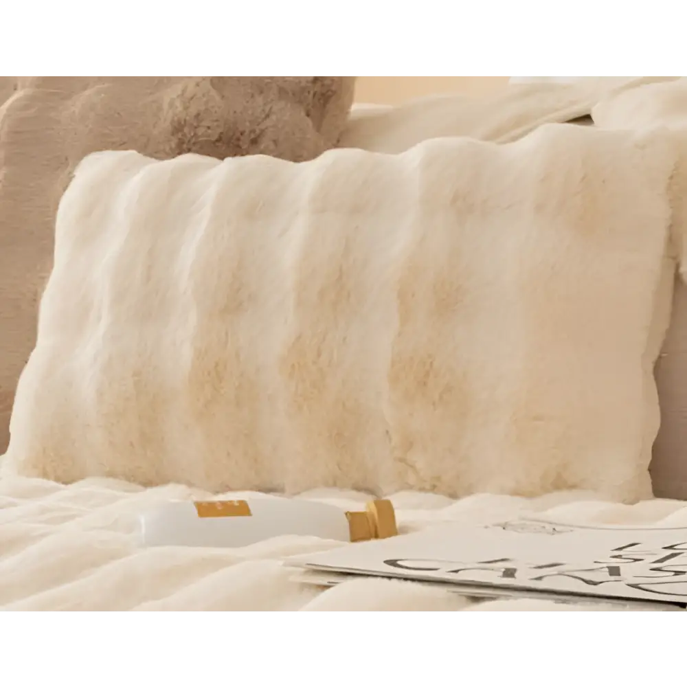 Cream-colored thickened rabbit plush sofa cushion with ribbed texture made of plush faux fur for winter use