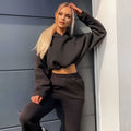 Black winter two piece sets women tracksuit with cropped hoodie and jogger pants featuring elastic waistband