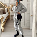 Black prada mini backpack with triangular logo and adjustable straps for winter two piece sets women tracksuit look